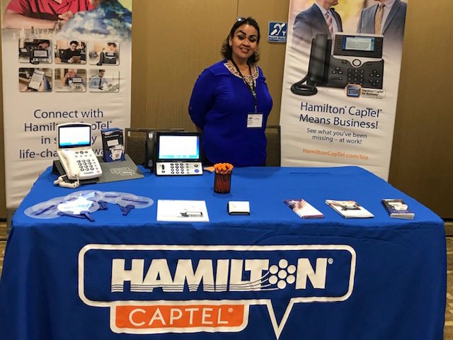 Hamilton CapTel at a tradeshow.
