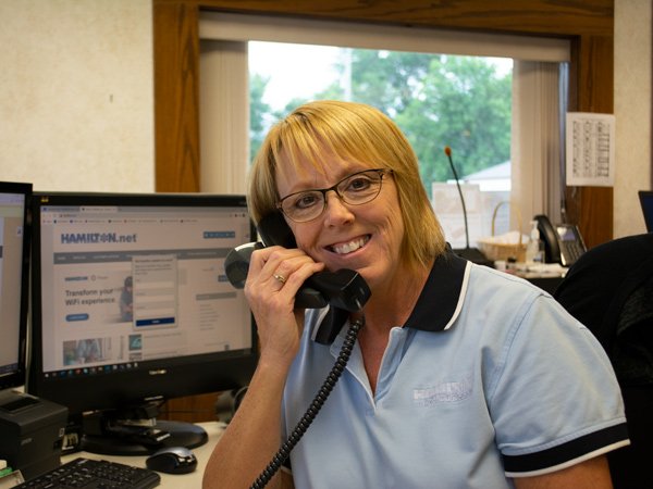 Customer service answering the phone.